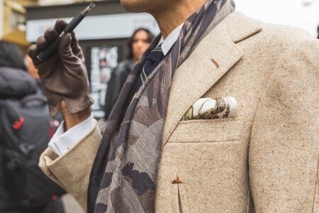 MILAN, ITALY - FEBRUARY 25: People gather outside Luisa Beccaria fashion show building for Milan Women's Fashion Week on FEBRUARY 25, 2016 in Milan.のeditorial素材