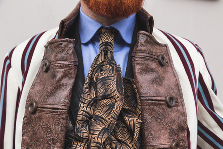 MILAN, ITALY - FEBRUARY 25: People gather outside Luisa Beccaria fashion show building for Milan Women's Fashion Week on FEBRUARY 25, 2016 in Milan.のeditorial素材