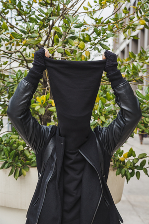 Stylish young bearded man posing in an urban contextの写真素材