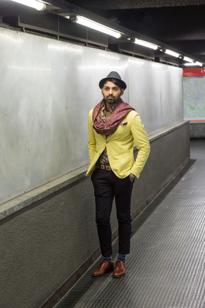 Portrait of an Indian young handsome man posing in an urban contextの写真素材