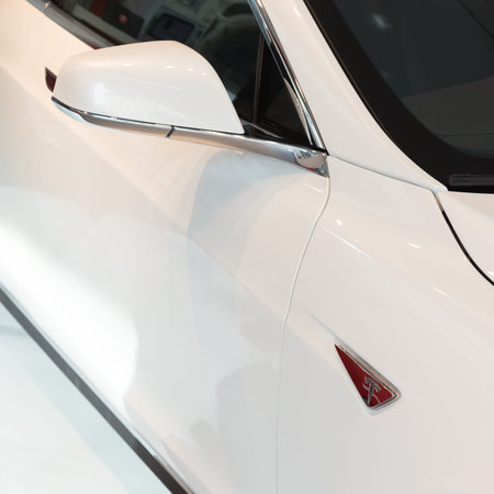 MILAN, ITALY - MARCH 31, 2016: Detail of Tesla Model S 90D car. Tesla Motors  is an American company that designs, manufactures, and sells cutting edge electric cars.のeditorial素材