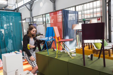MILAN, ITALY - APRIL 12: People visit Fuorisalone at Ventura Lambrate space, location of important events during Milan Design Week on APRIL 12, 2016 in Milan.のeditorial素材