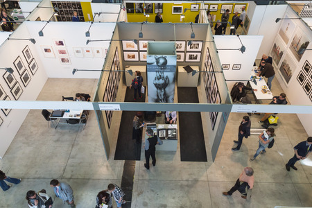 MILAN, ITALY - APRIL 29: Top view of people and booths at MIA, international photography and moving image art fair on APRIL 29, 2016 in Milanのeditorial素材