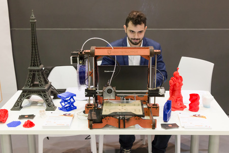 MILAN, ITALY - JUNE 7, 2016: 3d printer on display at Technology Hub, international event for innovative and futuristic technologies serving business.のeditorial素材