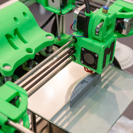MILAN, ITALY - JUNE 7, 2016: Detail of 3d printer on display at Technology Hub, international event for innovative and futuristic technologies serving business.のeditorial素材