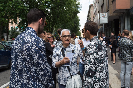 MILAN, ITALY - JUNE 18: Fashionable people gather outside Marni fashion show building for Milan...