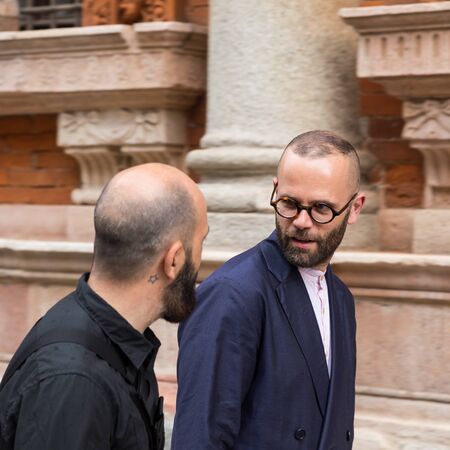 MILAN, ITALY - JUNE 19: Two fashionable guys pose outside Missoni fashion show building during Milan Men's Fashion Week on JUNE 19, 2016 in Milan.のeditorial素材