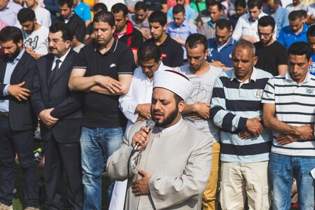 MILAN, ITALY - JULY 7: Muslim people take part in Eid, public celebration for the end of Ramadan on JULY 7, 2016 in Milan.のeditorial素材