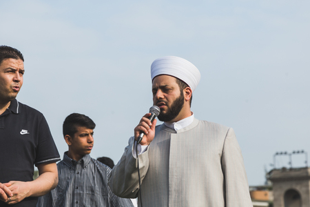 MILAN, ITALY - JULY 7: Muslim people take part in Eid, public celebration for the end of Ramadan on JULY 7, 2016 in Milan.のeditorial素材