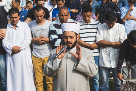 MILAN, ITALY - JULY 7: Muslim people take part in Eid, public celebration for the end of Ramadan on JULY 7, 2016 in Milan.のeditorial素材