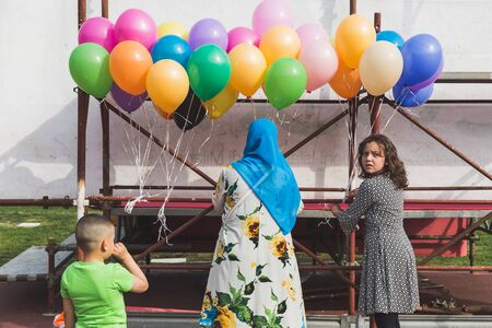MILAN, ITALY - JULY 7: Muslim people take part in Eid, public celebration for the end of Ramadan on JULY 7, 2016 in Milan.のeditorial素材