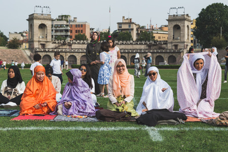MILAN, ITALY - JULY 7: Muslim people take part in Eid, public celebration for the end of Ramadan on JULY 7, 2016 in Milan.のeditorial素材