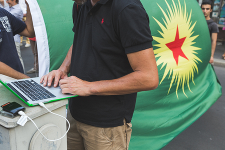 MILAN, ITALY - JULY 27, 2016: Kurdish activists protest against Turkish president Erdogan and his policy and ask freedom for PKK leader Ocalan.のeditorial素材