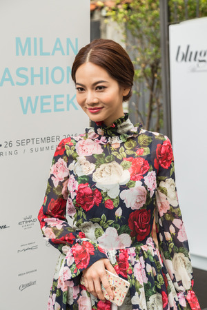MILAN, ITALY - SEPTEMBER 21, 2016: Fashionable woman poses outside Blugirl fashion show building during Milan Women Fashion Week SS17.のeditorial素材