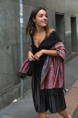 MILAN, ITALY - SEPTEMBER 21, 2016: Fashionable woman poses outside Fausto Puglisi fashion show building during Milan Women Fashion Week SS17.のeditorial素材