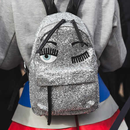 MILAN, ITALY - SEPTEMBER 22, 2016: Detail of backpack outside Genny fashion show building during Milan Women Fashion Week SS17.のeditorial素材