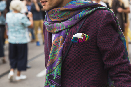 MILAN, ITALY - SEPTEMBER 22, 2016: Fashionable man poses outside Fendi fashion show building during Milan Women Fashion Week SS17.のeditorial素材