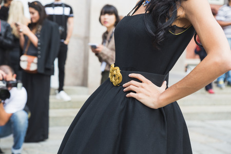 MILAN, ITALY - SEPTEMBER 22, 2016: Fashionable woman poses outside Pucci fashion show building during Milan Women Fashion Week SS17.のeditorial素材