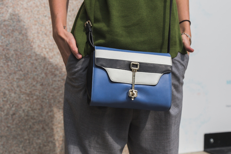 MILAN, ITALY - SEPTEMBER 22, 2016: Detail of bag outside Pucci fashion show building during Milan Women Fashion Week SS17.のeditorial素材