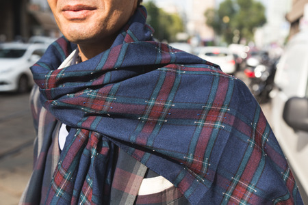 MILAN, ITALY - SEPTEMBER 23, 2016: Fashionable man poses outside Marco De Vincenzo fashion show building during Milan Women Fashion Week SS17.のeditorial素材