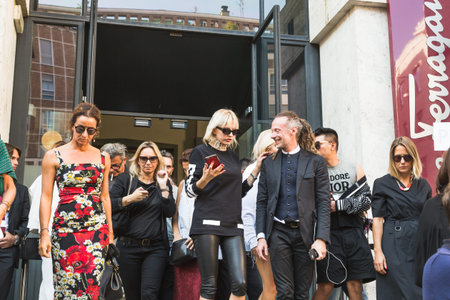 MILAN, ITALY - SEPTEMBER 25, 2016: Fashionable people gather outside Ferragamo fashion show building during Milan Women Fashion Week SS17.のeditorial素材