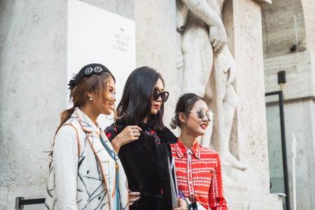 MILAN, ITALY - SEPTEMBER 25, 2016: Fashionable woman poses outside Ferragamo fashion show building during Milan Women Fashion Week SS17.のeditorial素材