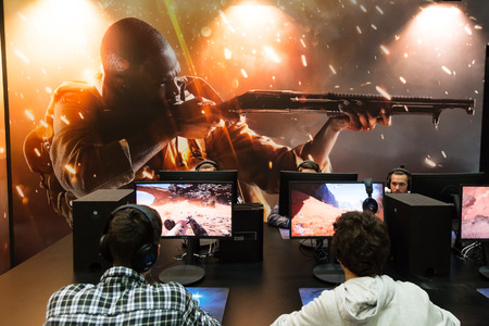 MILAN, ITALY - OCTOBER 14: People play at Games Week 2016, event dedicated to video games and electronic entertainment on OCTOBER 14, 2016 in Milan.のeditorial素材