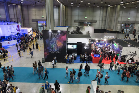 MILAN, ITALY - OCTOBER 14, 2016: Top view of people and booths at Games Week 2016, event dedicated...