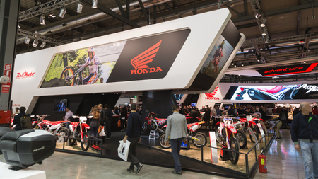 MILAN, ITALY - NOVEMBER 8: People visit EICMA, international motorcycle exhibition on NOVEMBER 8, 2016 in Milan.のeditorial素材