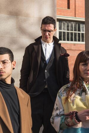 MILAN, ITALY - JANUARY 14: Fashionable man poses outside Antonio Marras fashion show building during Milan Men's Fashion Week on JANUARY 14, 2017 in Milan.のeditorial素材