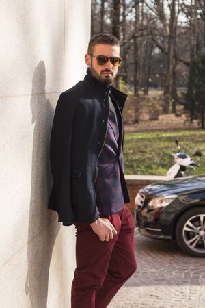 MILAN, ITALY - JANUARY 14: Fashionable man poses outside Antonio Marras fashion show building during Milan Men's Fashion Week on JANUARY 14, 2017 in Milan.のeditorial素材