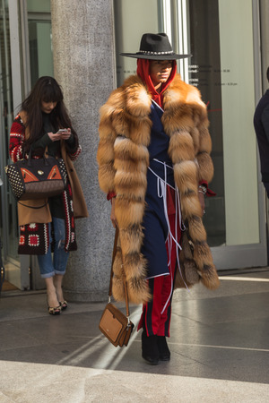 MILAN, ITALY - JANUARY 14: Fashionable man poses outside Antonio Marras fashion show building during Milan Men's Fashion Week on JANUARY 14, 2017 in Milan.のeditorial素材