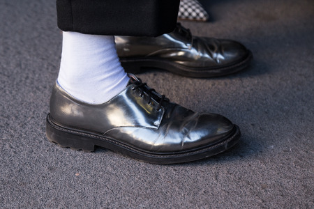 MILAN, ITALY - JANUARY 16: Detail of shoes outside Etro fashion show building during Milan Men's Fashion Week on JANUARY 16, 2017 in Milan.のeditorial素材