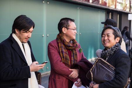 MILAN, ITALY - JANUARY 16: Fashionable people gather outside Etro fashion show building during Milan Men's Fashion Week on JANUARY 16, 2017 in Milan.のeditorial素材
