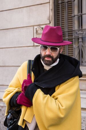 MILAN, ITALY - JANUARY 16: Fashionable man poses outside Etro fashion show building during Milan Men's Fashion Week on JANUARY 16, 2017 in Milan.のeditorial素材