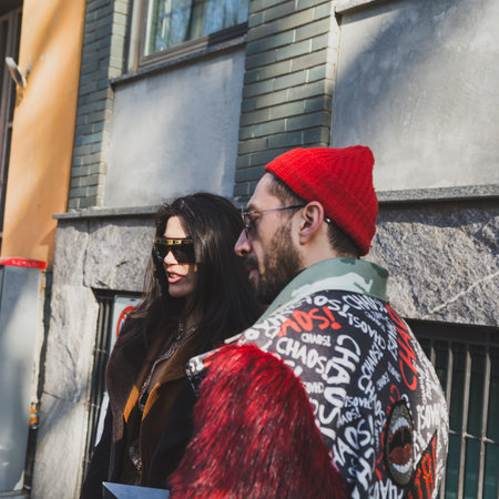 MILAN, ITALY - JANUARY 17: Fashionable people outside Armani fashion show building during Milan...