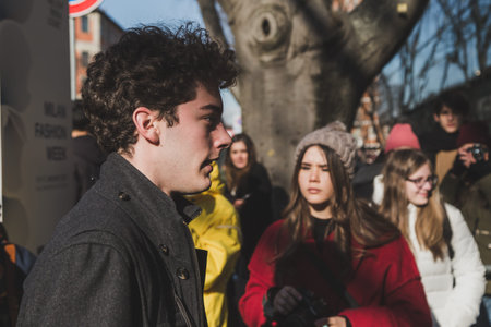 MILAN, ITALY - JANUARY 17: Fashionable people gather outside Armani fashion show building during Milan Men's Fashion Week on JANUARY 17, 2017 in Milan.のeditorial素材