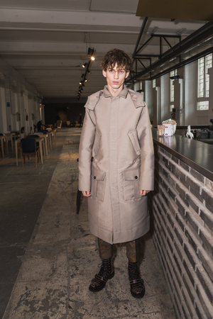 MILAN, ITALY - JANUARY 14: Beautiful model poses in the backstage just before Christian Pellizzari show during Milan Men's Fashion Week on JANUARY 14, 2017 in Milan.のeditorial素材