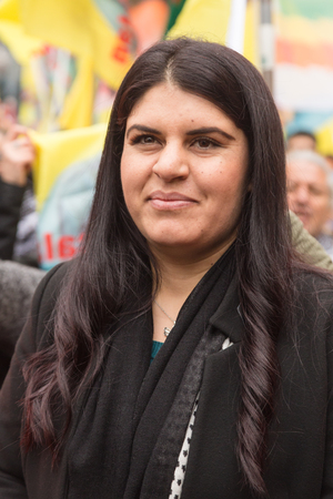 MILAN, ITALY - FEBRUARY 2, 2017: Dilek Ocalan marches with demonstrators protesting against the Turkish government and demanding the immediate release of their lpolitical leader Ocalan.のeditorial素材