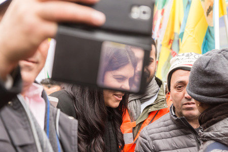 MILAN, ITALY - FEBRUARY 2, 2017: Dilek Ocalan marches with demonstrators protesting against the Turkish government and demanding the immediate release of their lpolitical leader Ocalan.のeditorial素材