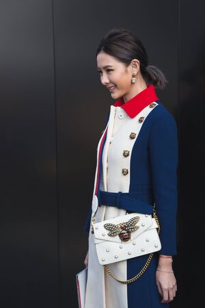 MILAN, ITALY - FEBRUARY 22: Fashionable woman poses outside Gucci fashion show building during Milan Women's Fashion Week on FEBRUARY 22, 2017 in Milan.のeditorial素材