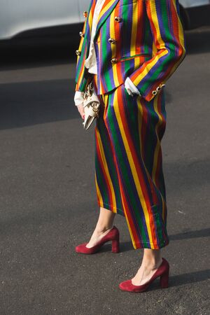 MILAN, ITALY - FEBRUARY 22: Fashionable woman poses outside Gucci fashion show building during Milan Women's Fashion Week on FEBRUARY 22, 2017 in Milan.のeditorial素材