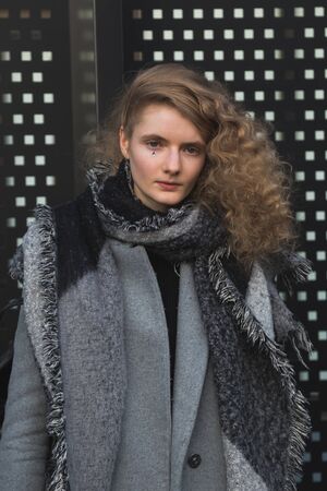 MILAN, ITALY - FEBRUARY 22: Beautiful model poses outside Gucci fashion show building during Milan Women's Fashion Week on FEBRUARY 22, 2017 in Milan.のeditorial素材
