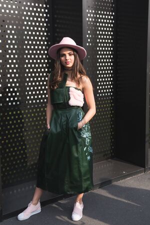 MILAN, ITALY - FEBRUARY 22: Fashionable woman poses outside Gucci fashion show building during Milan Women's Fashion Week on FEBRUARY 22, 2017 in Milan.のeditorial素材