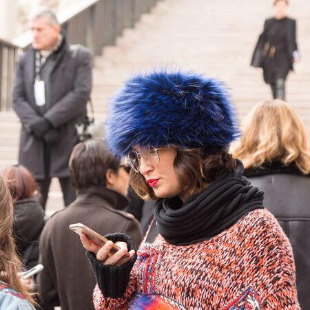 MILAN, ITALY - FEBRUARY 23: Fashionable woman poses outside Genny fashion show during Milan Women's Fashion Week on FEBRUARY 23, 2017 in Milan.のeditorial素材