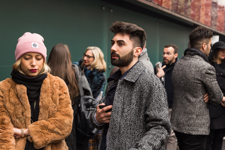MILAN, ITALY - FEBRUARY 24: Fashionable people pose outside Etro fashion show during Milan Women's Fashion Week on FEBRUARY 24, 2017 in Milan.のeditorial素材