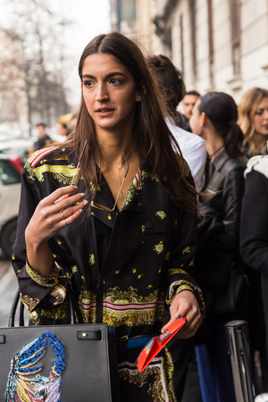 MILAN, ITALY - FEBRUARY 24: Fashionable woman poses outside Etro fashion show during Milan Women's Fashion Week on FEBRUARY 24, 2017 in Milan.のeditorial素材