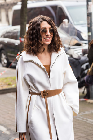 MILAN, ITALY - FEBRUARY 24: Fashionable woman poses outside Etro fashion show during Milan Women's Fashion Week on FEBRUARY 24, 2017 in Milan.のeditorial素材