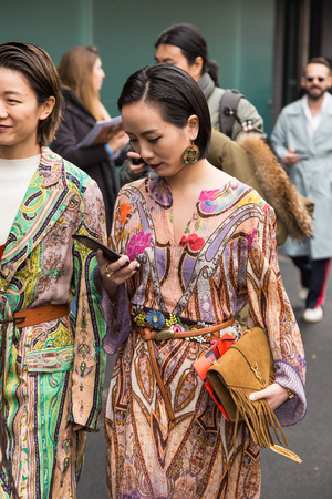 MILAN, ITALY - FEBRUARY 24: Fashionable woman poses outside Etro fashion show during Milan Women's Fashion Week on FEBRUARY 24, 2017 in Milan.のeditorial素材