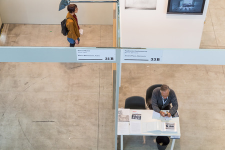 MILAN, ITALY - MARCH 10: People visit MIA, international photography and moving image art fair on MARCH 10, 2017 in Milan.のeditorial素材